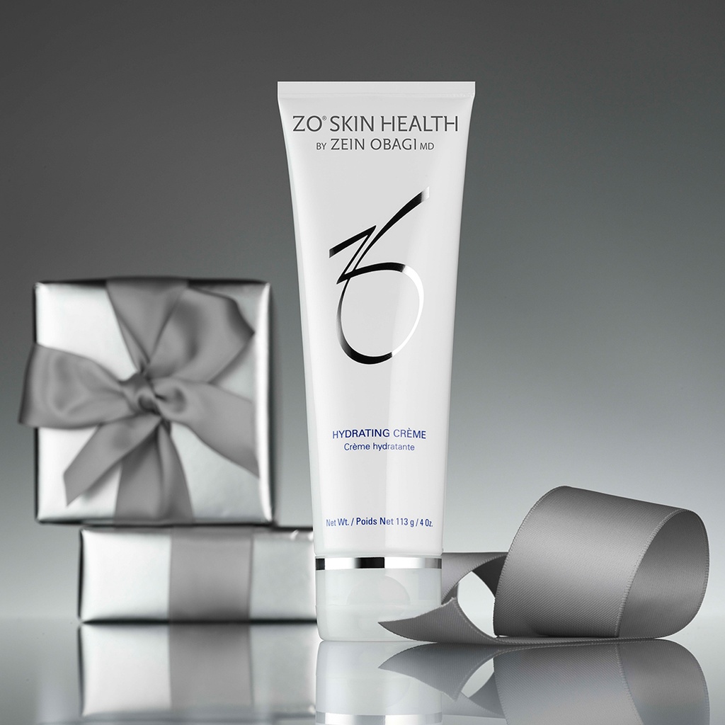 Zo Skin Hydrating Creme de la marca ZO SKIN HEALTH: Sobre fondo gris con regalos plateados